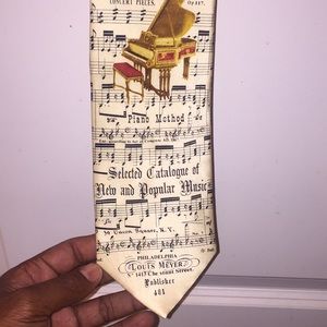 Brand new Museum Artifacts Tie Piano edition